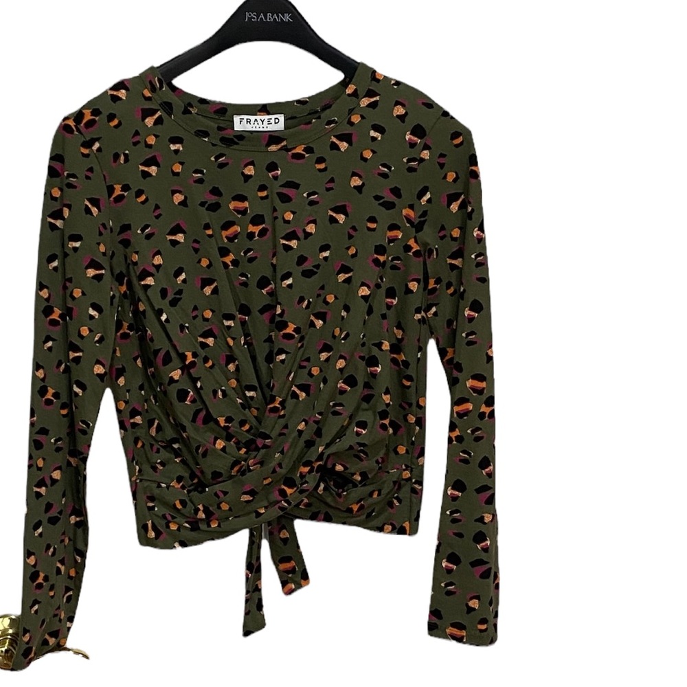 Frayed crop top with wrap around tie bottom. Animal print. Size: Small NWT